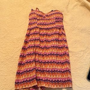 Multicolor girls dress. Has cups with little pads in it, with spaghetti straps.